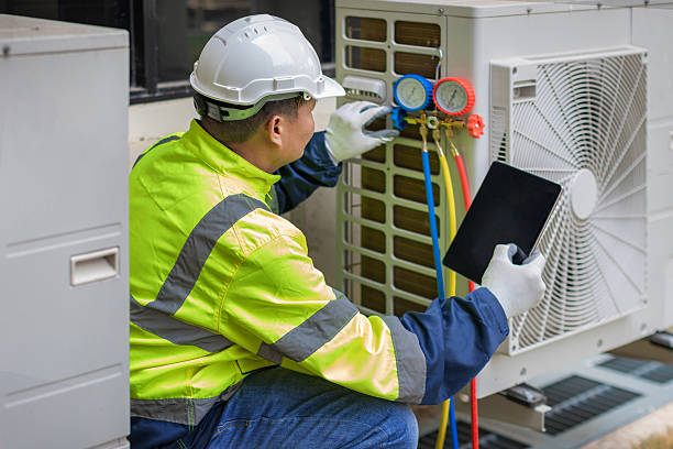 Professional Emergency Hvac Repair technician working in Harveysburg, OH